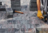 Concrete finishing and landscaping craftsmanship